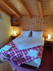 A picture of a bedroom in a catered ski chalet